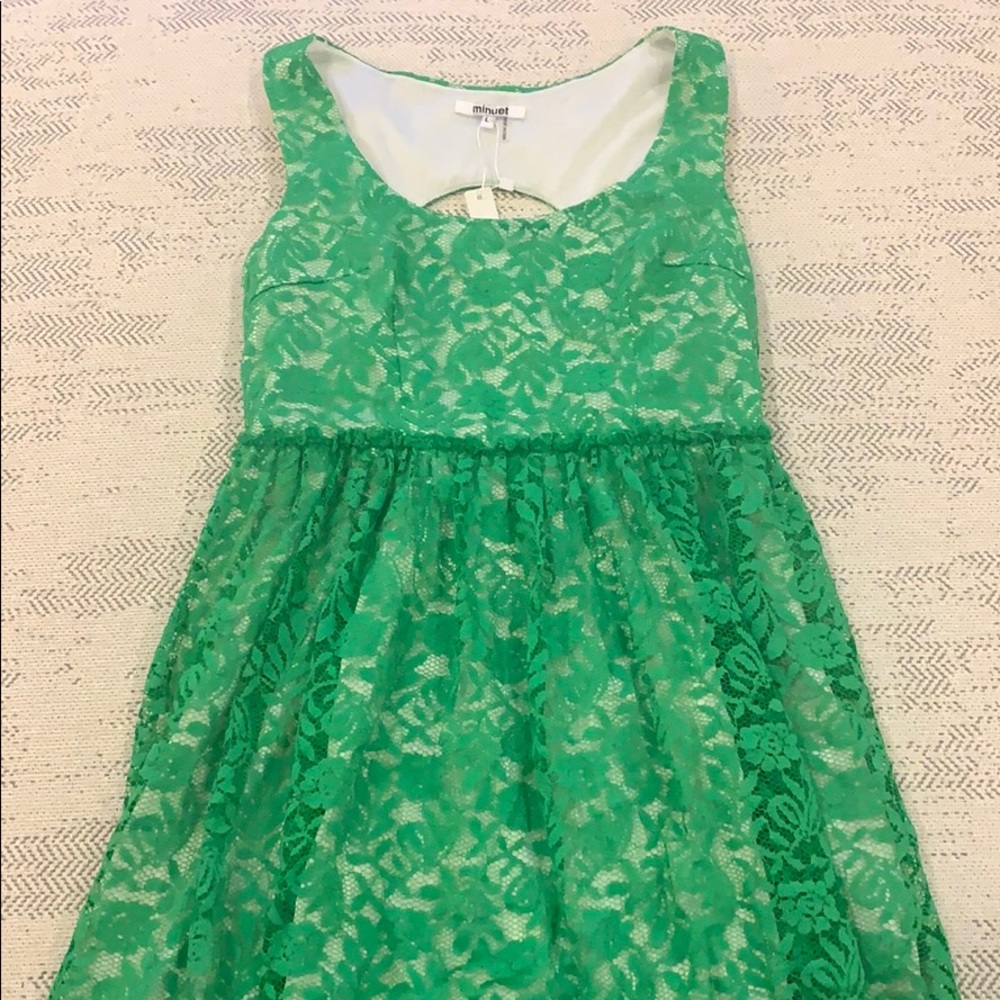 Green lace open back dress